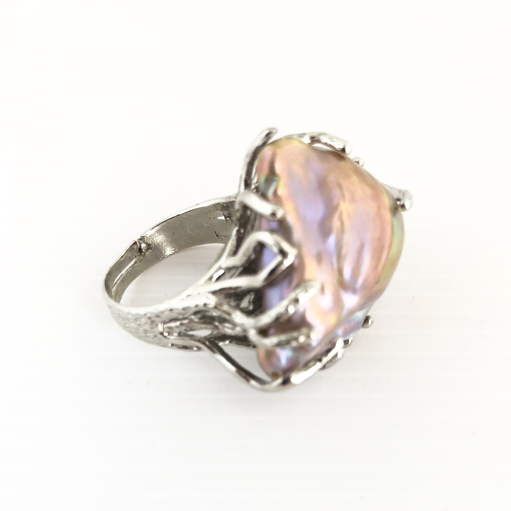 Anello in metallo con perla