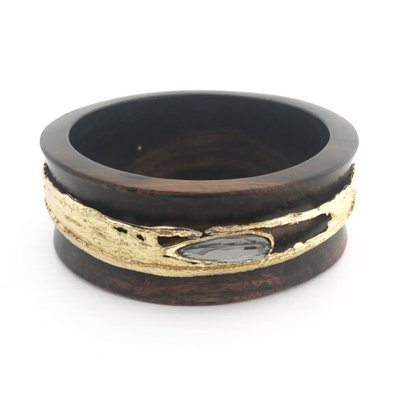 Bracciale in ebano con fascia in bronzo