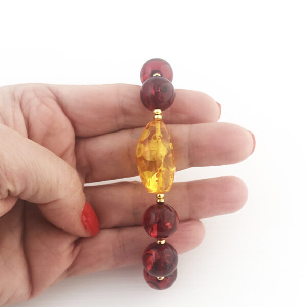 Bracciale in pasta di ambra rossa e gialla