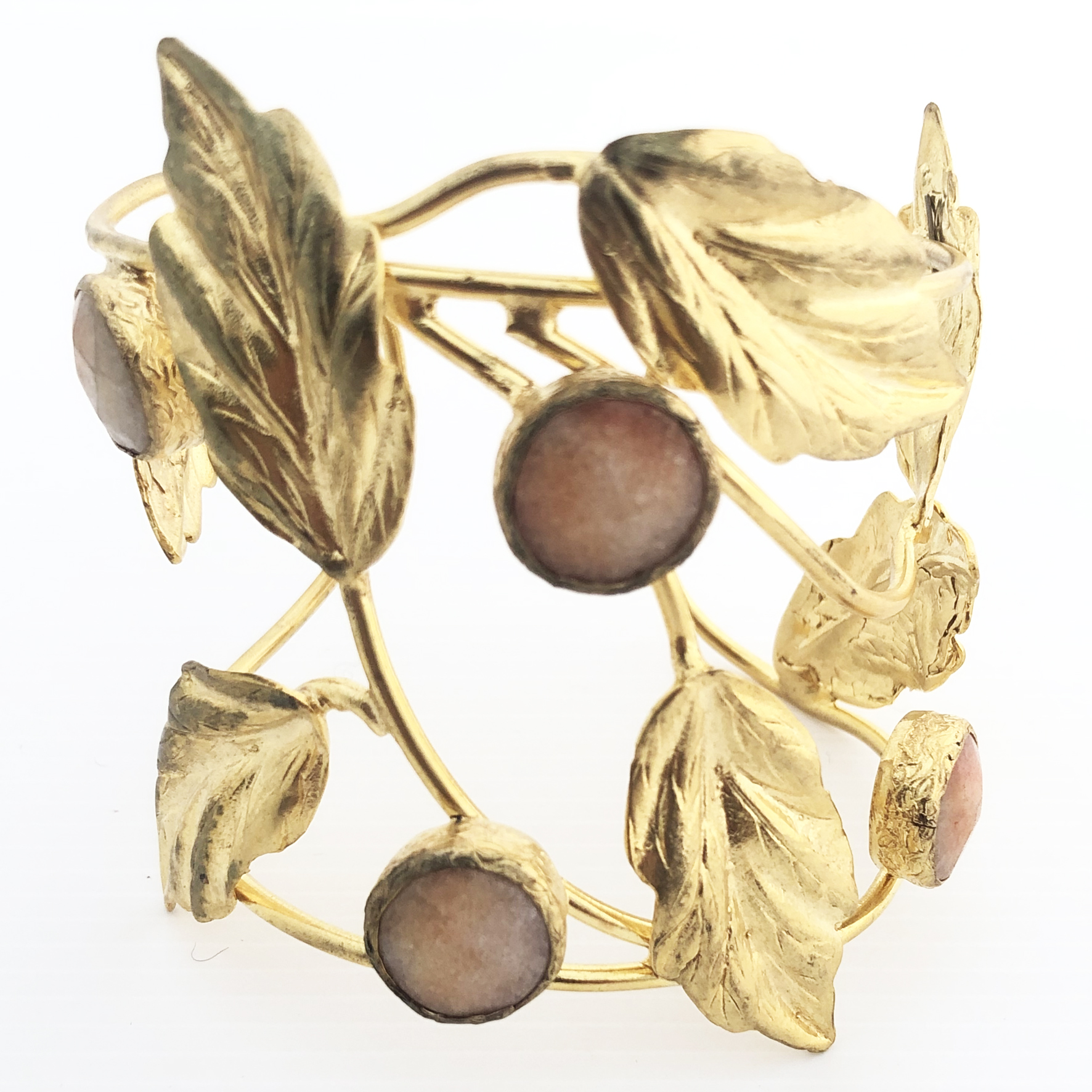 Bracciale rigido dorato con foglie
