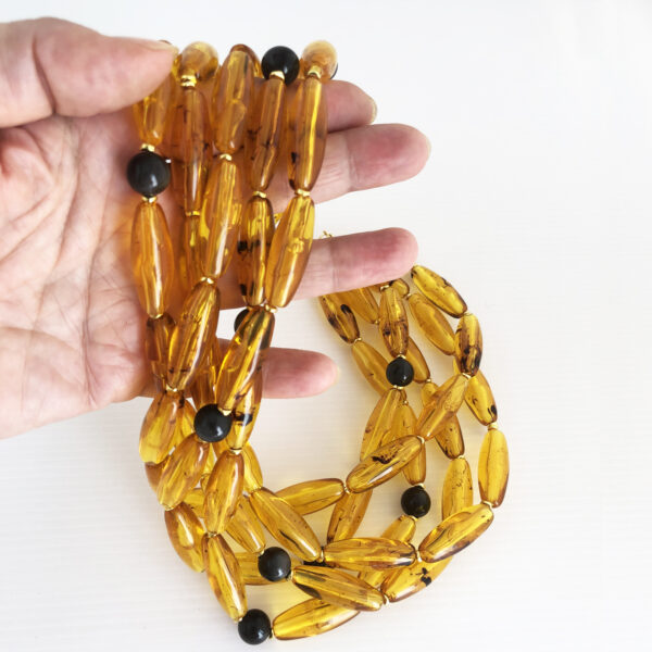Collana con ambra ovale e onice