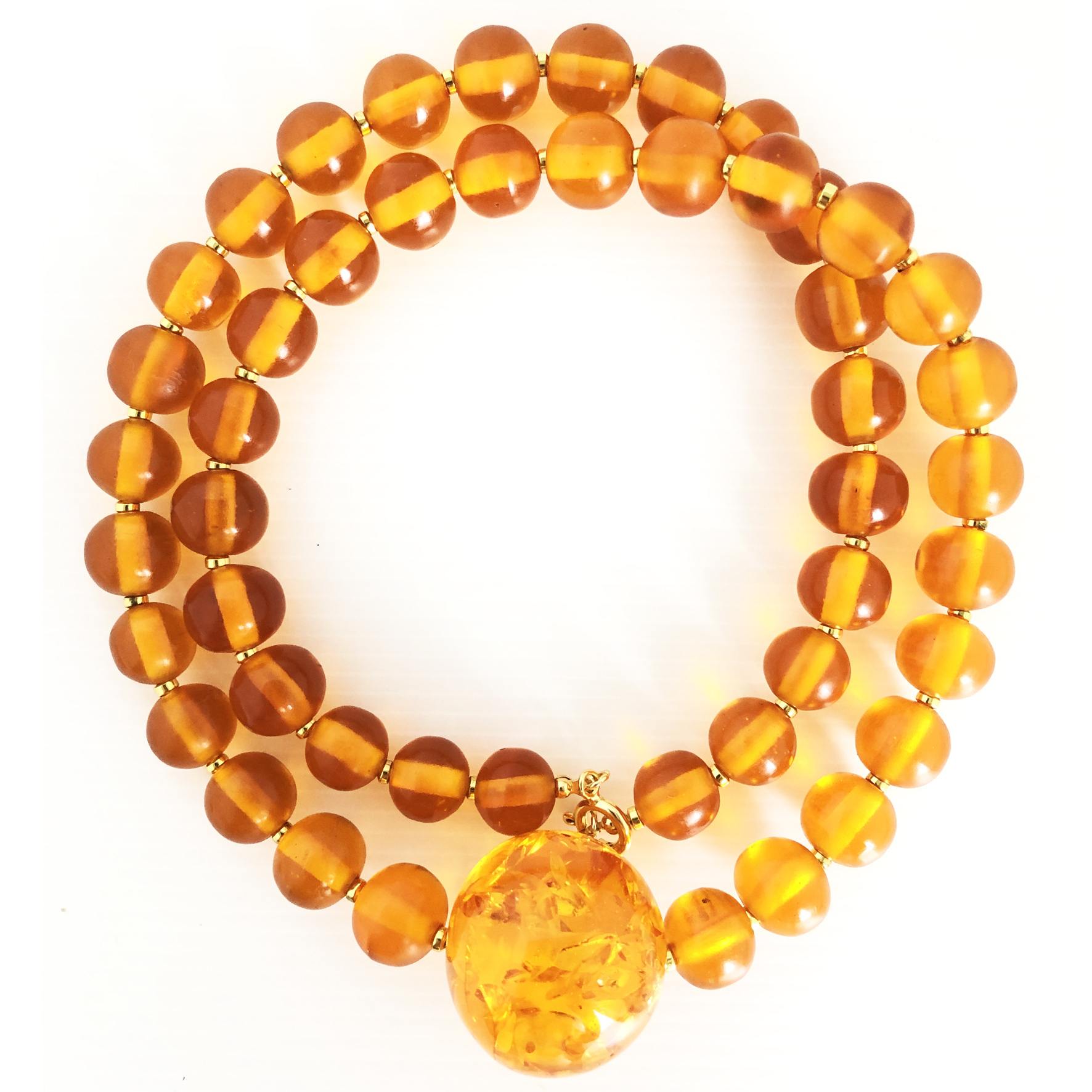 Collana lunga in ambra con centrale