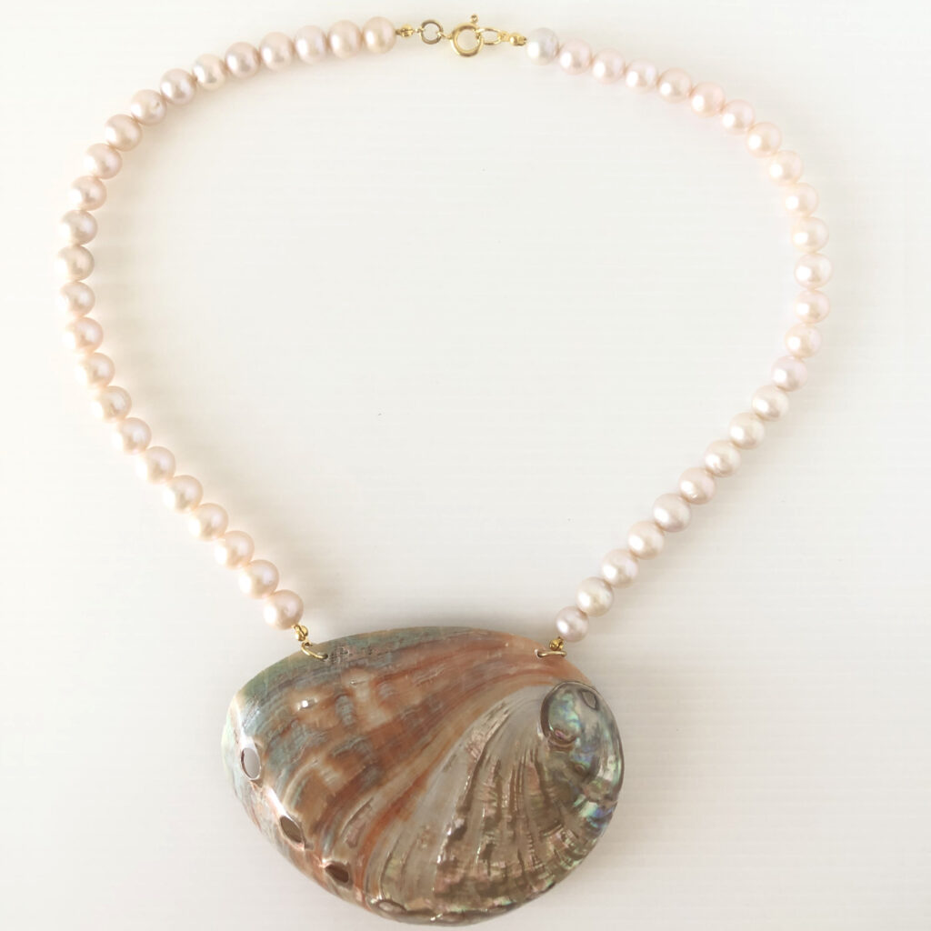 Collana perle rosa con conchiglia