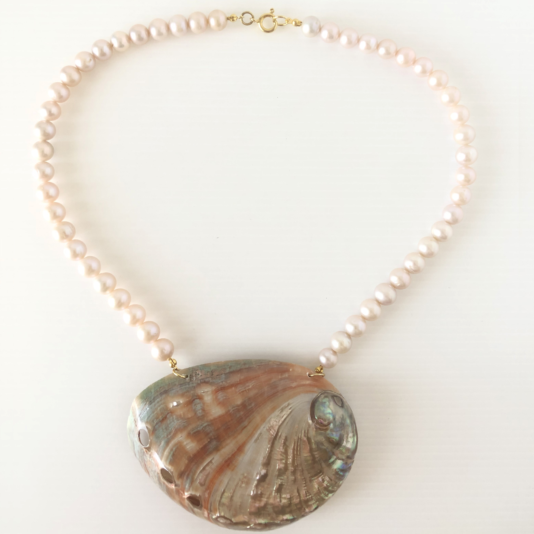 Collana perle rosa con conchiglia
