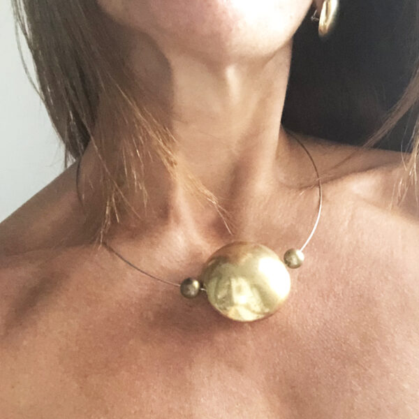 Collier in acciaio con centrale passante in dorato