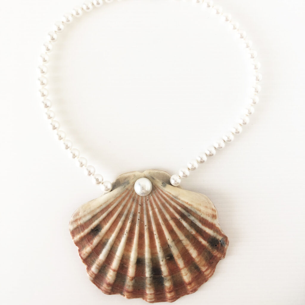 Perle con conchiglia centrale